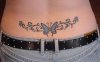 tribal-butterfly-lower-back-tattoo.jpg